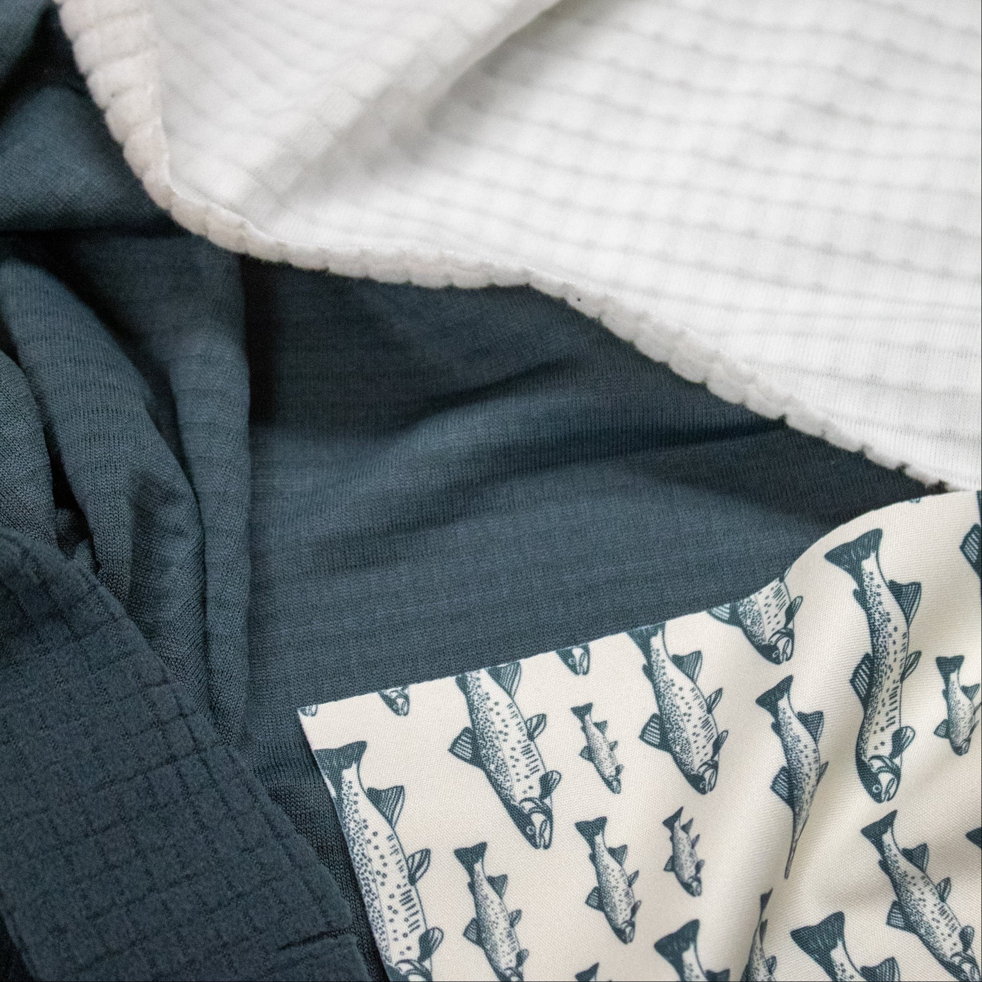 Textile with fish pattern on a neutral background