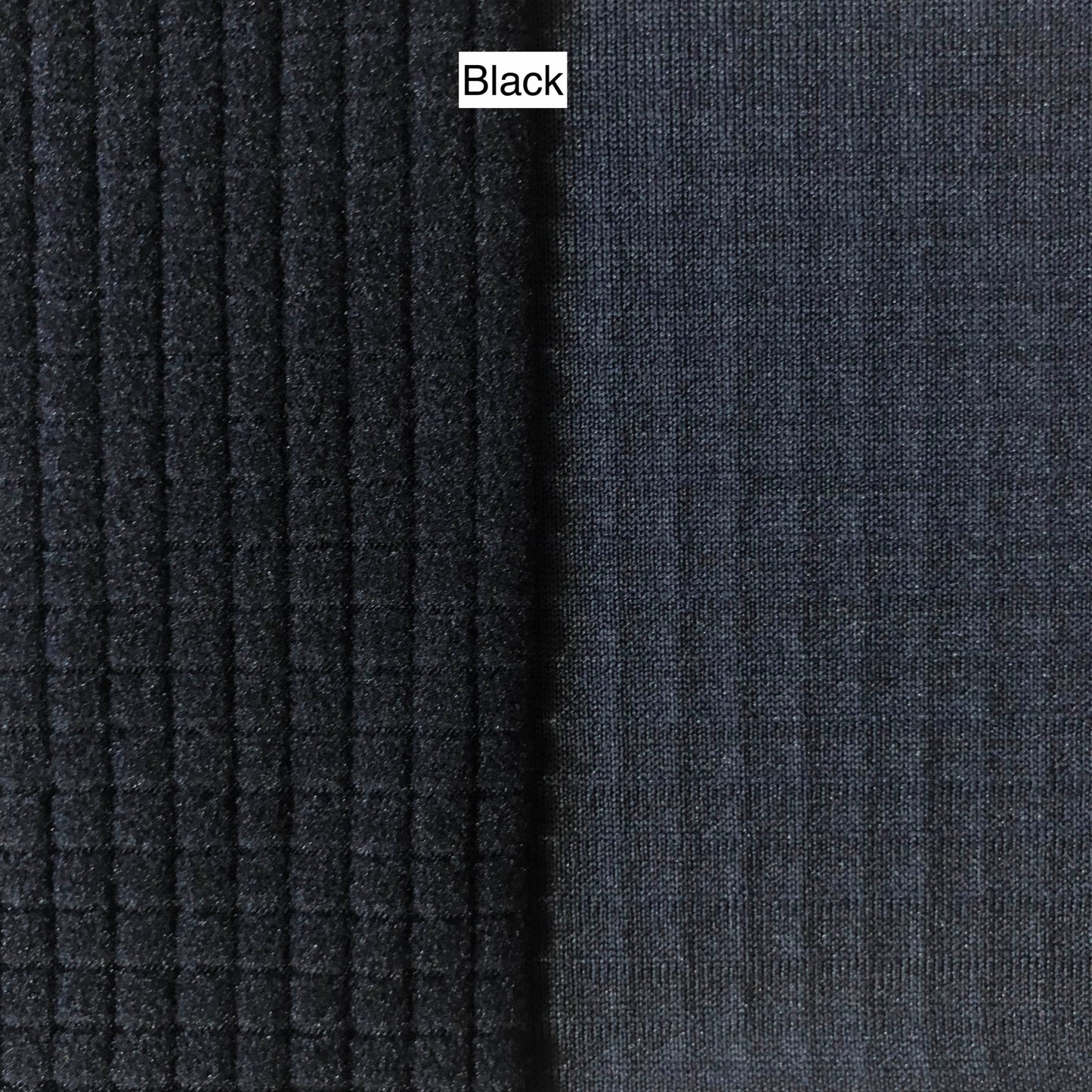 A swatch of Black Polartec® Power Grid™ fleece.